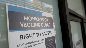 A sign is displayed outside a DC Health monkeypox vaccine clinic