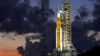 The NASA Artemis rocket with the Orion spacecraft aboard is seen on pad 39B just after sunset at the Kennedy Space Center