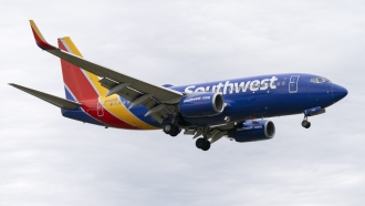 A Southwest Airlines flight prepares to land at Reagan National Airport, in Arlington, VA