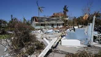 Damaged homes and debris is seen on Sanibel Island, in the aftermath of Hurricane Ian