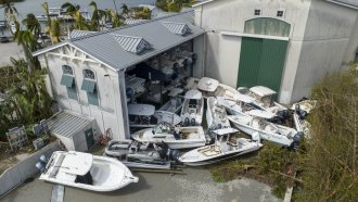 Boats damaged by Hurricane Ian