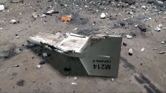 wreckage of what Kyiv has described as an Iranian Shahed drone downed near Kupiansk, Ukraine.
