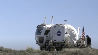 A NASA rover travels.