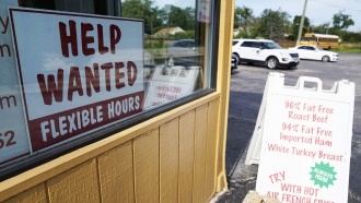 A help wanted sign is displayed