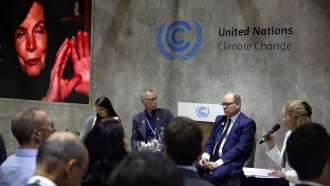 Panelists attend a discussion at the COP27 U.N. Climate Summit.