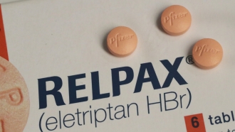 a box of RELPAX migraine pills manufactured by Pfizer are arranged for a photo in Doral, Fla.