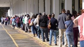 Georgia voters line up for early voting on Saturday, Nov. 26, 2022