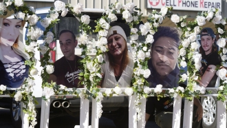 Photographs of victims of a mass shooting at Club Q are shown.