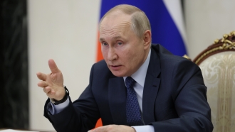 Russian President Vladimir Putin is shown.