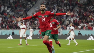 Morocco's Youssef En-Nesyri celebrates after scoring his side's first goal during the World Cup quarterfinals.