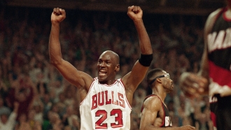 Michael Jordan celebrates the Bulls win over the Portland Trail Blazers in the NBA Finals in Chicago