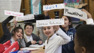 students display some of their cursive writing work and exercises at P.S. 166 in the Queens borough of New York