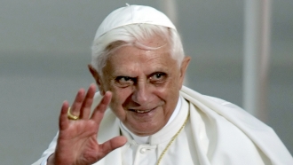 Pope Benedict XVI waves during the farewell ceremony at Cologne airport, Germany.