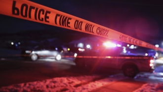 Police crime tape surrounds a Utah crime scene.
