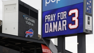 A sign shows support for injured Buffalo Bills NFL football player Damar Hamlin