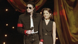 Michael Jackson and Lisa Marie Presley-Jackson acknowledge applause from the audience at the MTV Awards