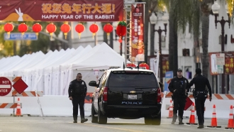 Authorities search for motive in Lunar New Year massacre