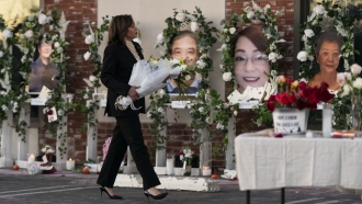 Vice President Kamala Harris visits a memorial set up outside Star Dance Studio in Monterey Park, California