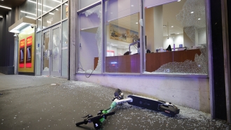 Broken windows at a Wells Fargo following violent protests in Atlanta.