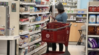 A shopper looking at an item in a Target store.