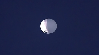 A high-altitude balloon floats over Billings, Montana.