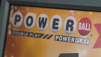 A display panel advertises for the Powerball lottery.
