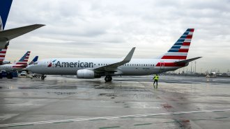 An American Airlines plane heads toward the runway at Newark Liberty International Airport.