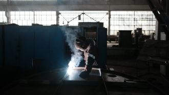 A worker welds part of a shelter in a plant of the Metinvest company, in Kryvyi Rih, Ukraine.