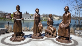 A monument depicting suffragists titled "Ripples of Change" by artist Jane DeDecker on display in Seneca Falls, New York.