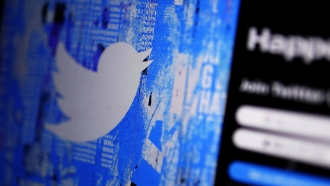 The Twitter splash page is seen on a digital device