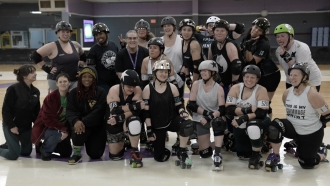 Members of the Dominion Derby Girls roller derby team