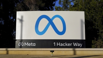 Meta's logo can be seen on a sign at the company's headquarters in Menlo Park, Calif.,