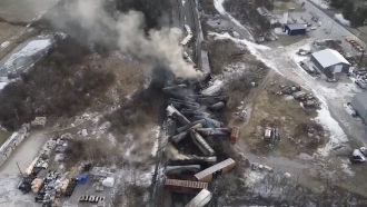 The train derailment in East Palestine, Ohio is shown.