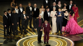 The cast and crew of "Everything Everywhere All at Once" accepts the award for best picture at the Oscars