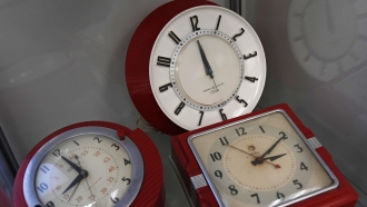A selection of vintage clocks are displayed at the Electric Time Company