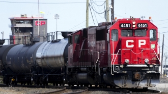 Canadian Pacific trains sit idle on the tracks due to a strike at the main CP Rail train yard