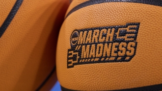 Basketball with the NCAA March Madness logo.