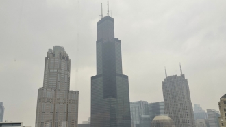 The Willis Tower in Chicago obscured partially by wildfire smoke in June 2023.