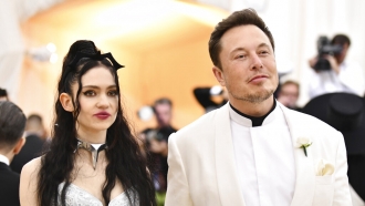 Grimes and Elon Musk are pictured.