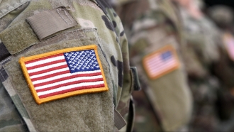 U.S. Army service members in uniform are shown.