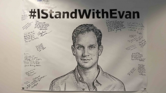A poster shows colleagues' support for reporter Evan Gershkovich