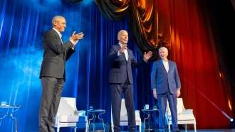 President Joe Biden, center, and former presidents Barack Obama and Bill Clinton