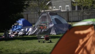 A homeless tent set up in the park