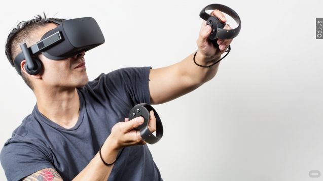 A person plays with the Oculus Rift and Touch controllers