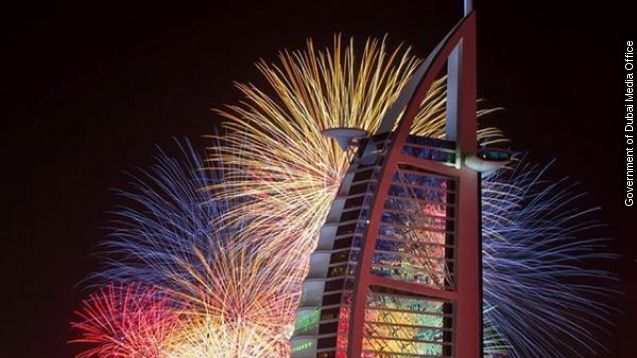 The Burj Al Arab is illuminated by fireworks in Dubai's New Year's Eve celebration.