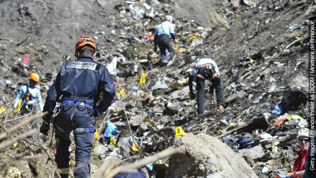 Rescue workers continue their search operation near the site of the Germanwings plane crash.