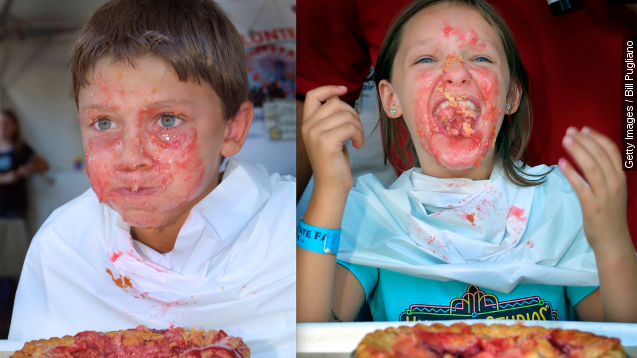 Kids competing in pie-eating contest