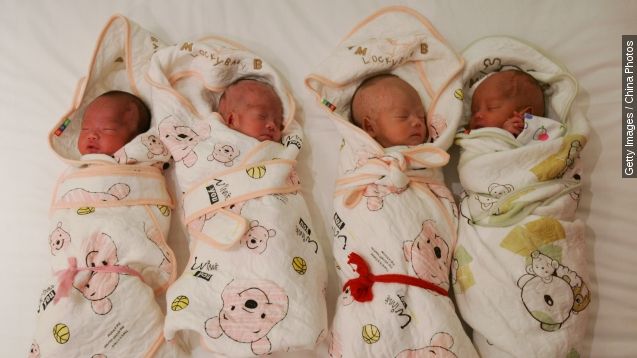 The one month old quadruplets sleep prior to leaving the Tongji Hospital with their mother, Deng Qin, and father, Deng Weijun, to go back home on July 27, 2007 in Wuhan of Hubei Province, China.