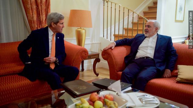 U.S. Secretary of State John Kerry sits with Iranian Foreign Minister Javad Zarif on January 16, 2015, at the Palais Coburg Hotel in Vienna, Austria, before a meeting about the implementation of the Joint Comprehensive Plan of Action outlining the shape of Iran's nuclear program.