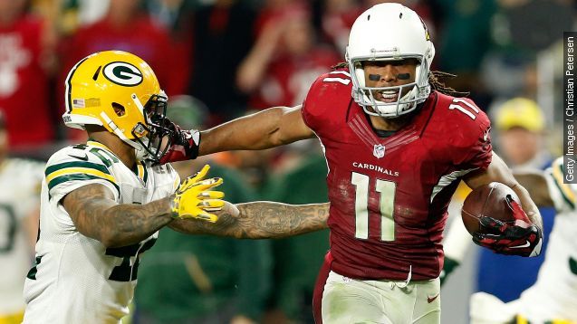 Wide receiver Larry Fitzgerald #11 of the Arizona Cardinals stiff arms strong safety Morgan Burnett #42 of the Green Bay Packers during overtime of the NFC Divisional Playoff Game at University of Phoenix Stadium on January 16, 2016 in Glendale, Arizona.